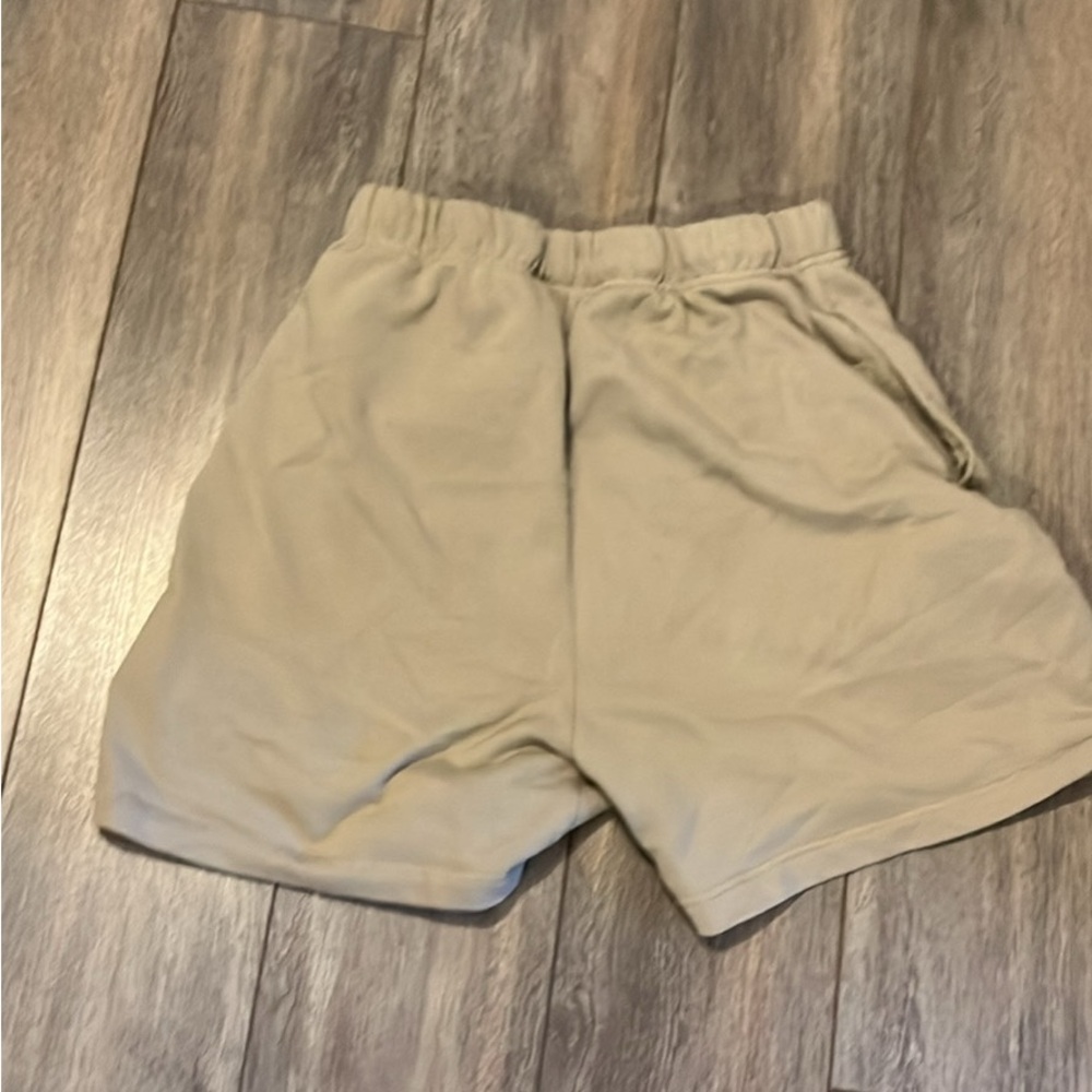 beige essentials fear of god shorts